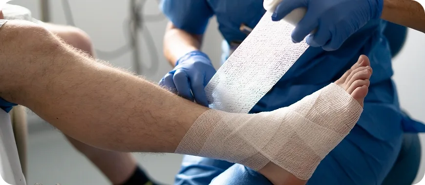 nurse-bandaging-patient-s-injured-ankle-in-hospita-2025-05-21-19-02-44-utc 1